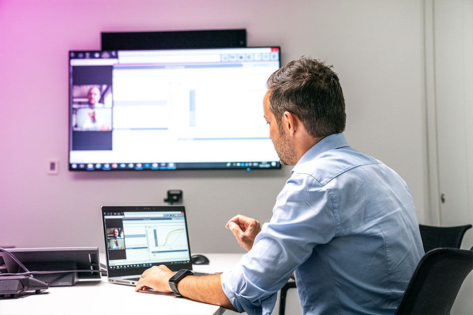 Sales employees holding a virtual meeting